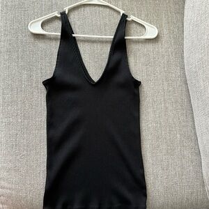 Tank top by Express One Eleven. 57% cotton 38% Modal 5% Spandex